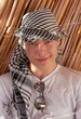 Portrait of young man in keffiyeh