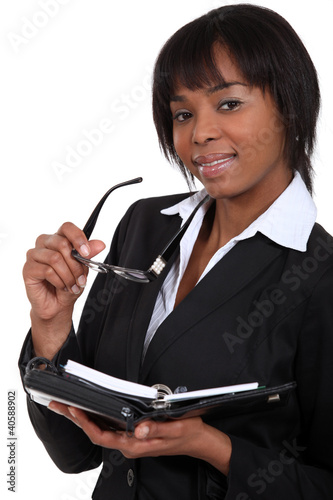 Photo: Businesswoman with an open diary Businesswoman with an open diary
