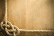 ship ropes and compass on old wood