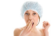 Young woman wearing bath cap