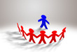 A group paper people holding hands indicating community A group paper people holding hands indicating community