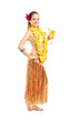 Female dressed in a hawaiian costume holding a cocktail