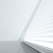 Open jalousie and shade on a wall from light from a window