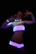 sexy girl with glow make-up in ultraviolet light