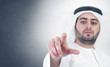 arabian businessman in a virtual click button scene