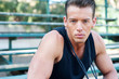 Photo: portrait of a young athletic man with jump rope portrait of a young athletic man with jump rope
