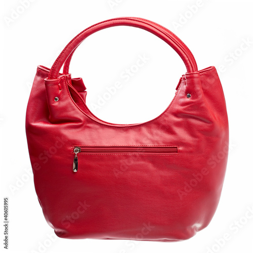 Photo: Leather women bag isolated over white Leather women bag isolated over white
