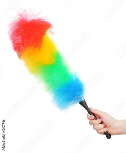 Photo: Soft colorful duster in hand on white Soft colorful duster in hand on white