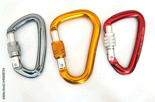 Photo: Climbing equipment - three multicolor carabiners Climbing equipment - three multicolor carabiners