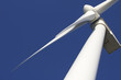 A wind-turbine against a clear blue sky A wind-turbine against a clear blue sky