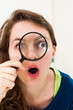 woman with magnifying glass woman with magnifying glass