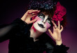 woman mime with knife