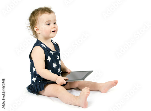 Photo: Baby playing with tablet Baby playing with tablet