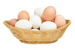 Natural Chicken Eggs in a Woven Straw Basket isolated on white