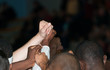 multiracial fist raised at sport