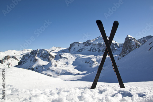 Photo: Pair of cross skis in snow Pair of cross skis in snow
