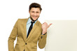 Man pointing at blank poster