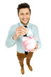 Man putting money in piggy bank