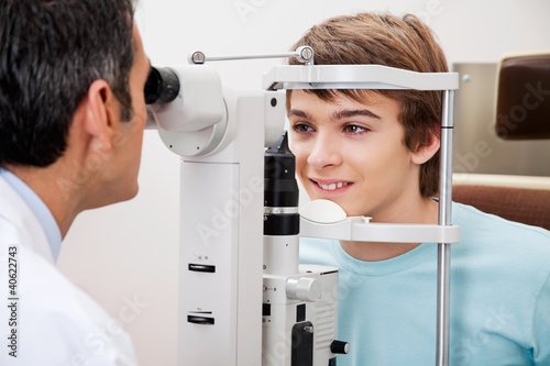 Photo: Visual Field Test Performed On a Boy Visual Field Test Performed On a Boy