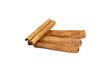 Four cinnamon sticks isolated on white