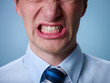 angry man shouting at camera. Close up