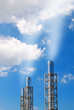 smoking chimneys under cloudy sky smoking chimneys under cloudy sky
