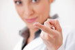 Optometrist Showing Contact Lens