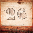 old paper with hand drawn number 26