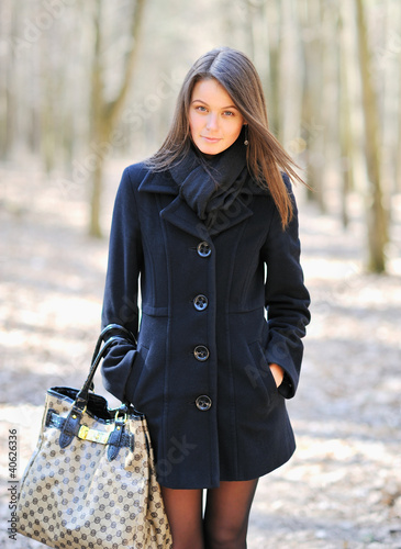 Photo: Pretty young woman looking serious Pretty young woman looking serious