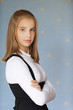 Beautiful girl-teenager with arms crossed