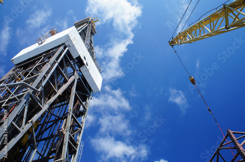 Photo: Derick of Offshore Jack Up Drilling Rig And A Rig Crane Derick of Offshore Jack Up Drilling Rig And A Rig Crane