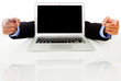 Laptop with hands pointing
