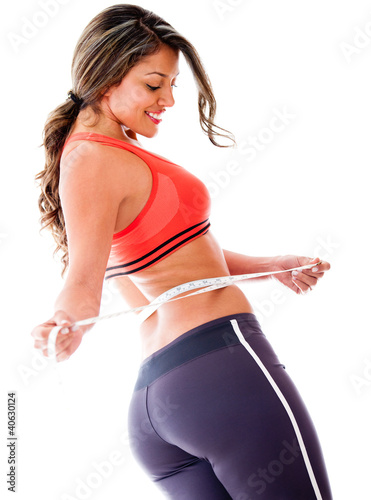 Foto: Woman taking body measurements Woman taking body measurements