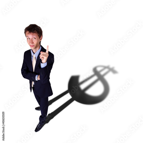 Illustration: Businessman with shadow as a currency symbol Businessman with shadow as a currency symbol