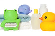 Baby bath accessories isolated: towels, toys, bottles