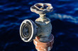 Old rusty water valve at pier
