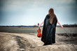 The red-haired girl with a violin outdoor