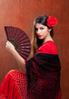 Gipsy flamenco dancer Spain girl with red rose