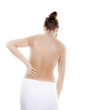 Woman massaging pain back isolated on white background Woman massaging pain back isolated on white background