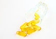 vitamins in glass on white background vitamins in glass on white background