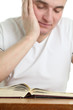 Man studying the Bible. Focus on the Bible