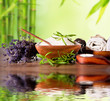 Spa still life with bamboo background and water surface
