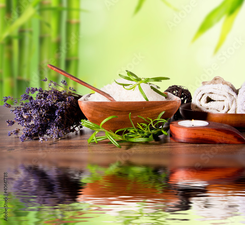 Photo: Spa still life with bamboo background and water surface Spa still life with bamboo background and water surface