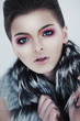 Attractive glamorous sexy woman brunette in fur collar