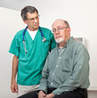 Male Doctor or Nurse Listening to Depressed Senior Patient
