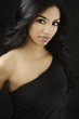 Beautiful young woman in little black dress