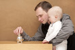 Foto: man saves money for his child man saves money for his child