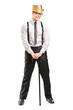 Stylish man with hat holding a cane Stylish man with hat holding a cane