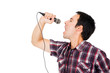 handsome young man singing to the microphone, isolated on white handsome young man singing to the microphone, isolated on white
