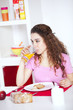 Woman at her breakfast